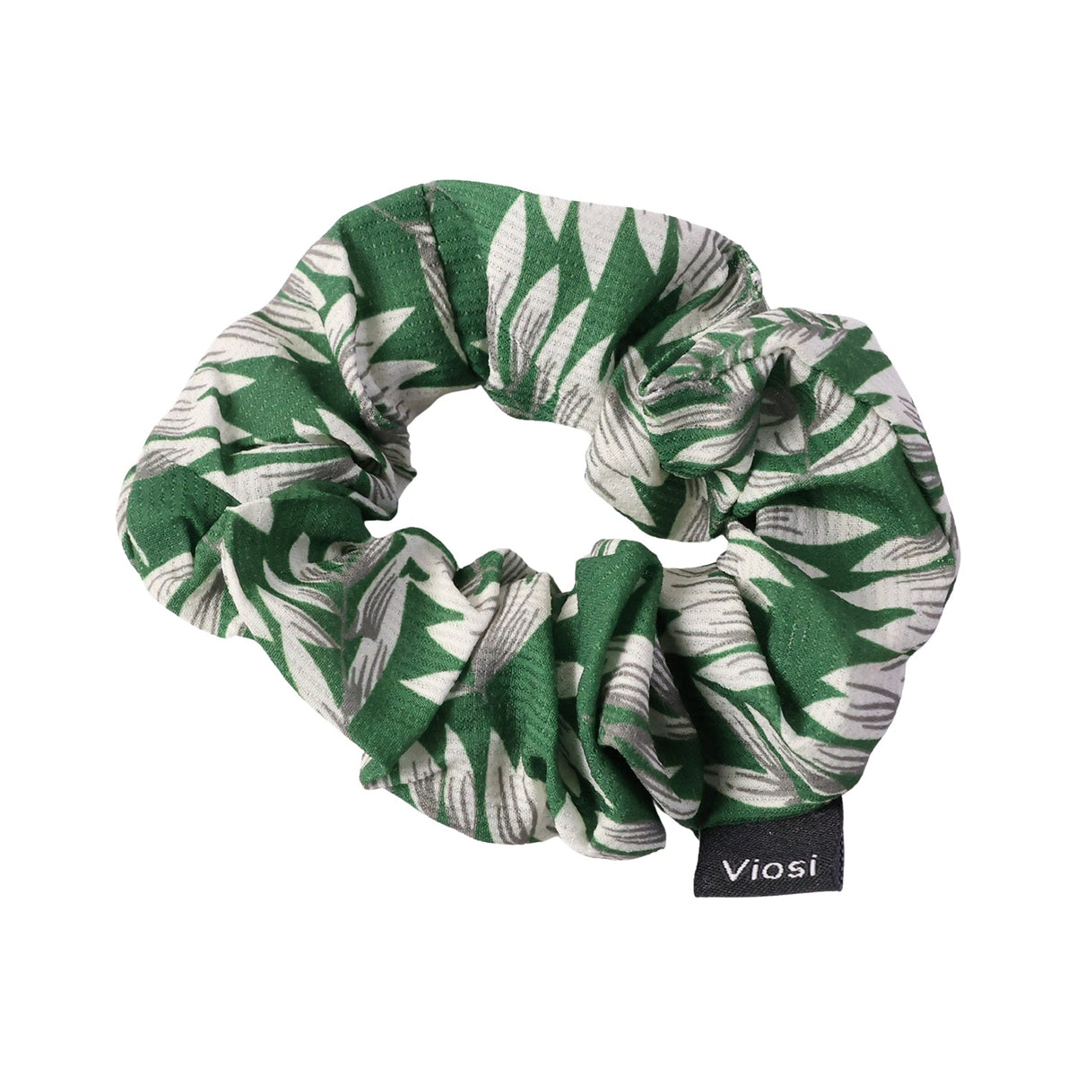 Fashionable fabric scrunchie worn on the wrist as a trend accessory
