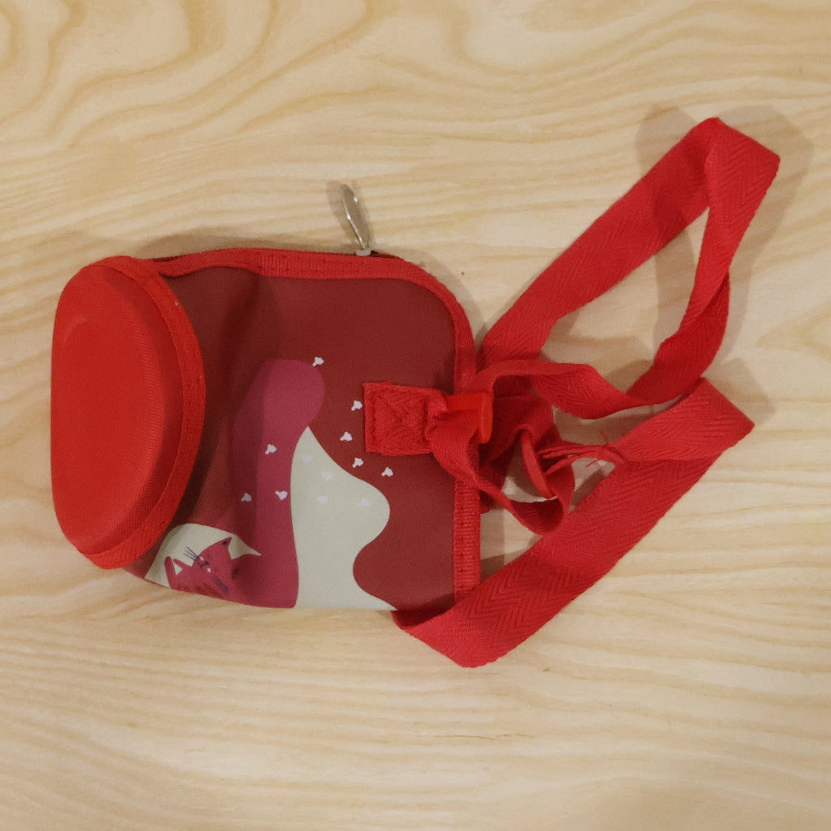Stylish and functional water bottle carrier sling for outdoor and travel needs