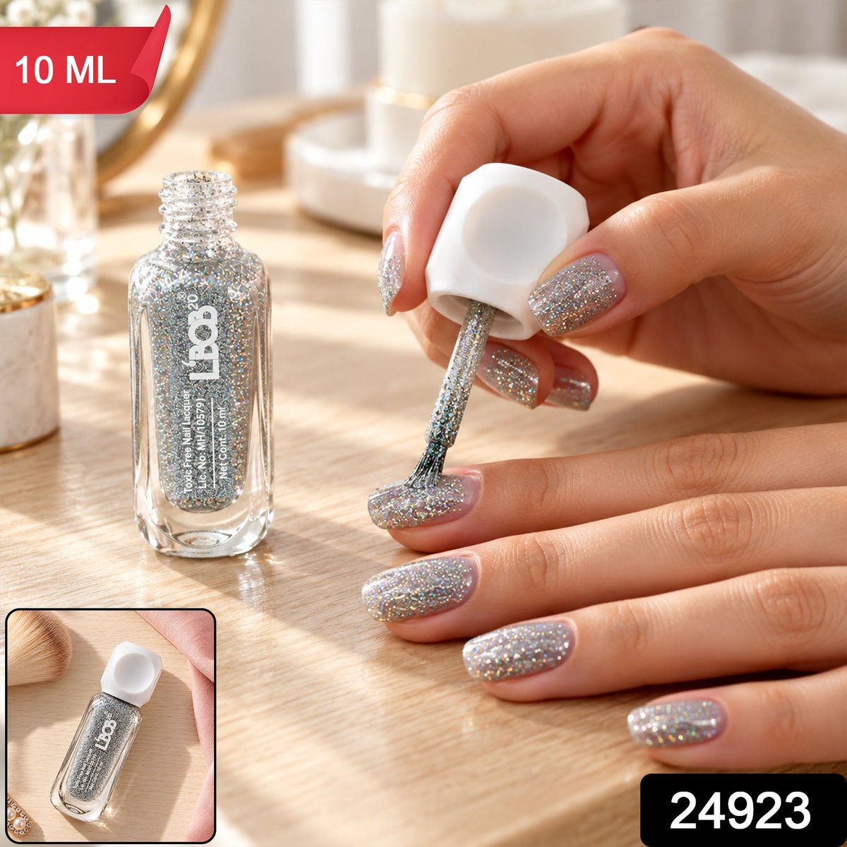 A woman's hand applies silver glitter nail polish, with an inset showing the bottle and brush.