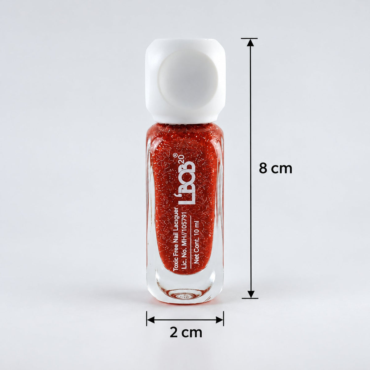 A small, clear glass bottle of red glitter nail polish with a white cap, showing 8 cm height and 2 cm width.
