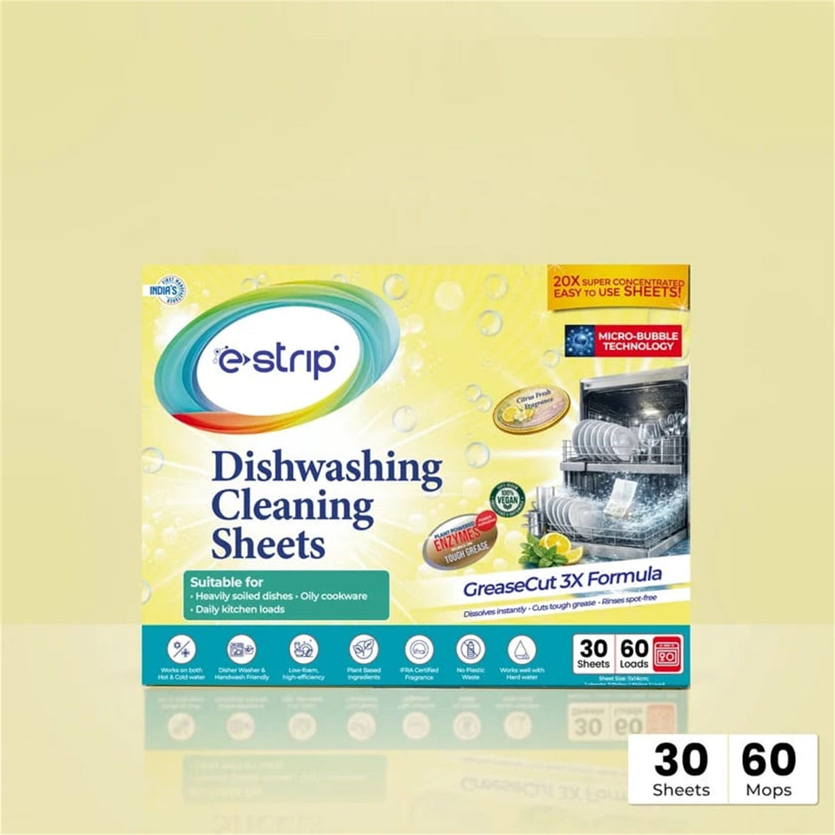 A box of e-strip dishwashing cleaning sheets on a plain yellow background with a reflection.
