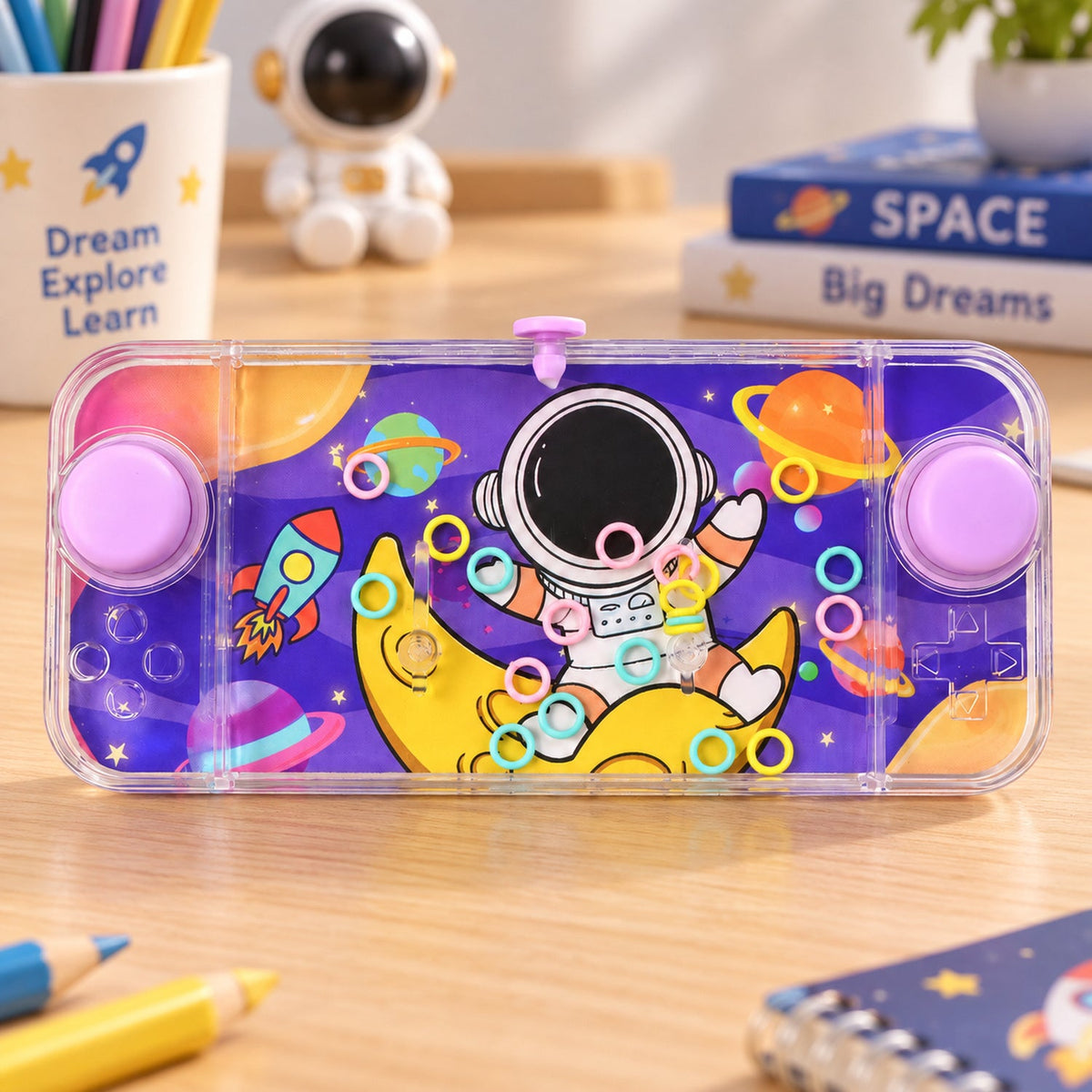 Close-up of the purple water game with an astronaut on a crescent moon surrounded by colorful planets and rings.