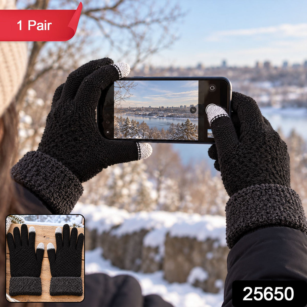 Hands in black knit gloves with gray cuffs and white touchscreen fingertips, photographing a snowy vista with a smartphone.