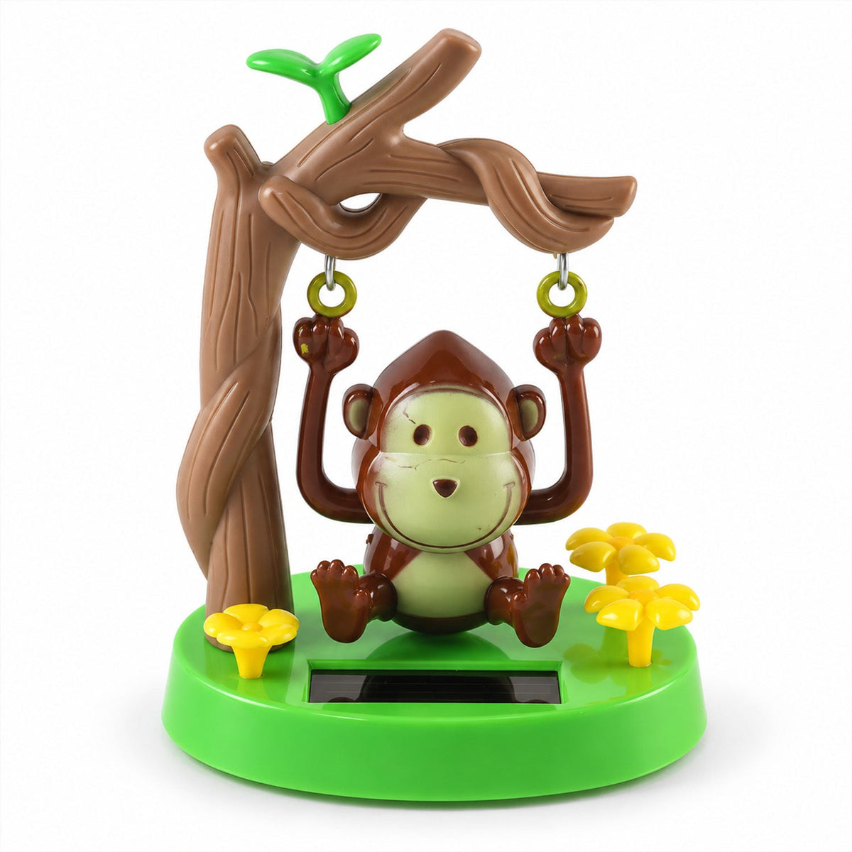 A close-up view of the brown monkey swinging from a tree branch on a green base with yellow flowers, against a white