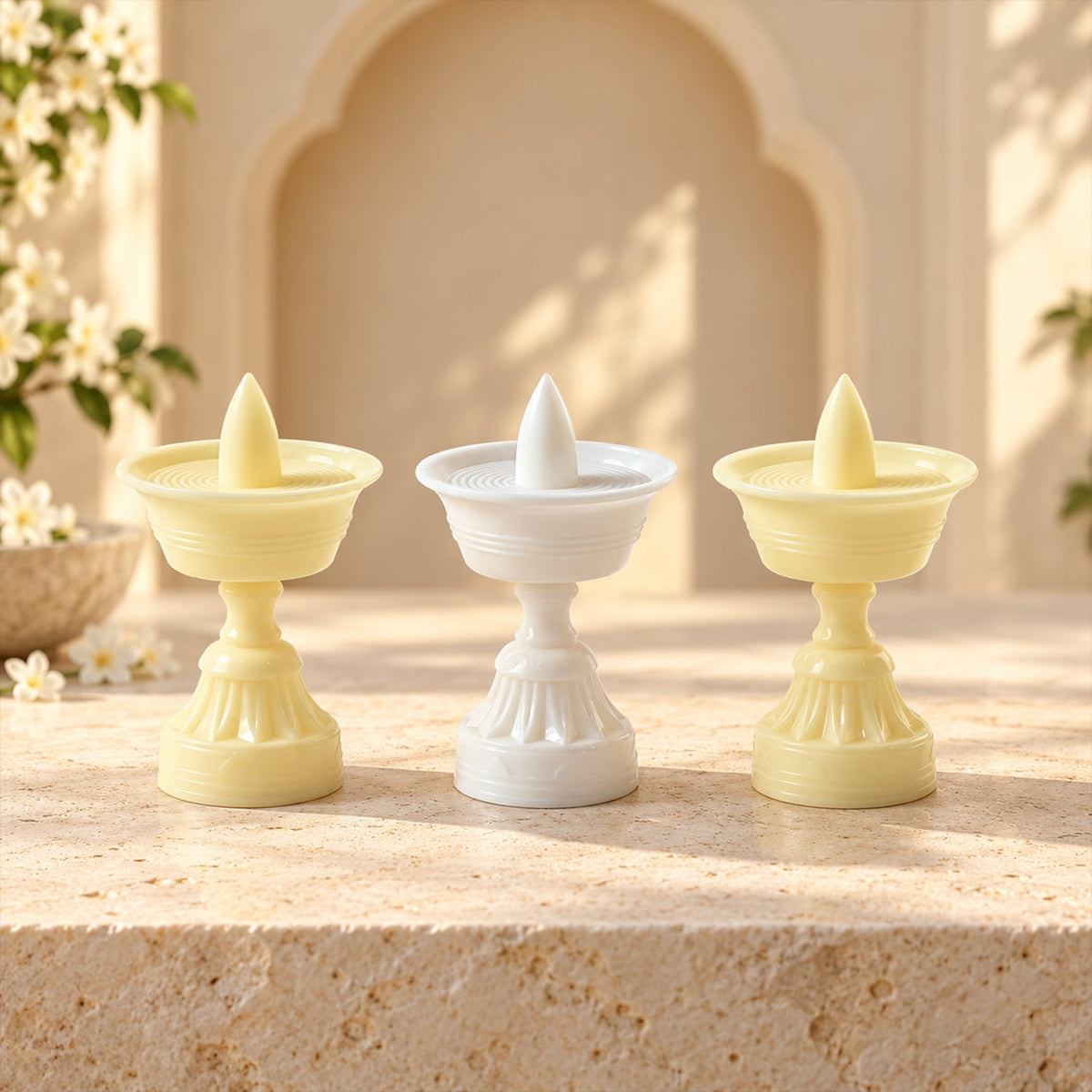 Side view of a flameless LED diya with its warm yellow light on a wooden surface