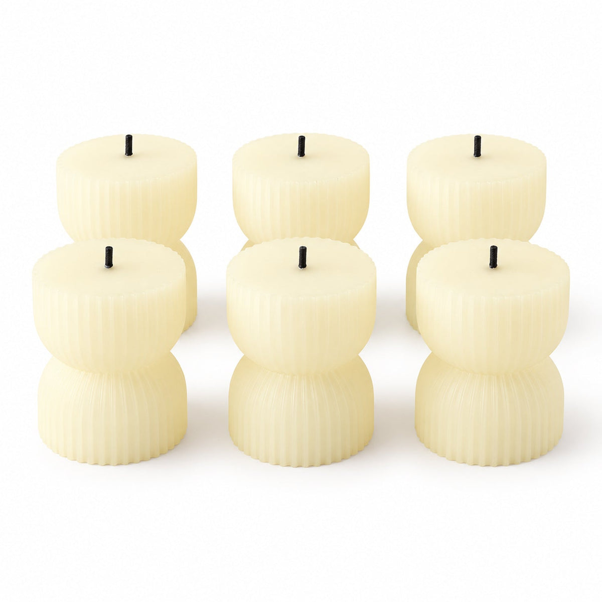 Six cream-colored ribbed LED candles with black wicks, arranged in two rows on a plain white background.