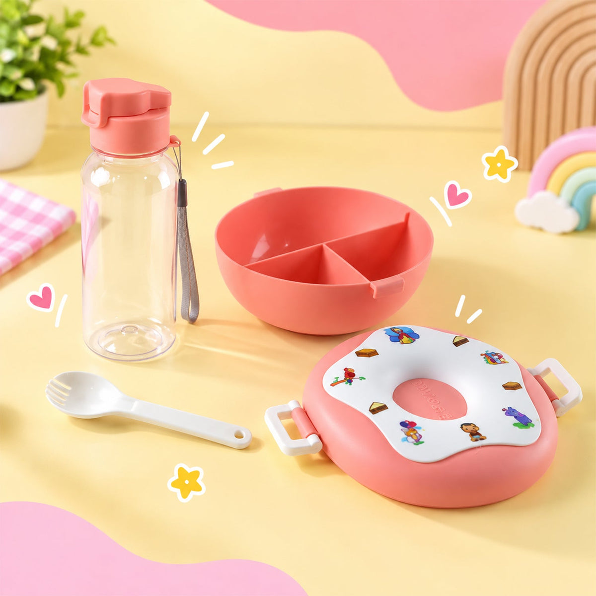 A pink donut-shaped lunch box, a clear water bottle, and a divided bowl with a white spoon on a bright yellow and pink