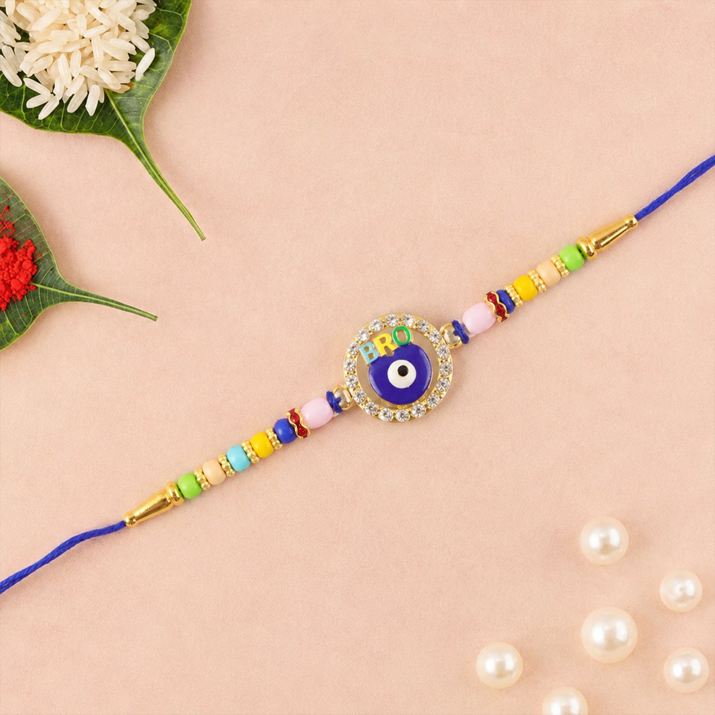 Elegant evil eye charm on designer Rakhi with beads