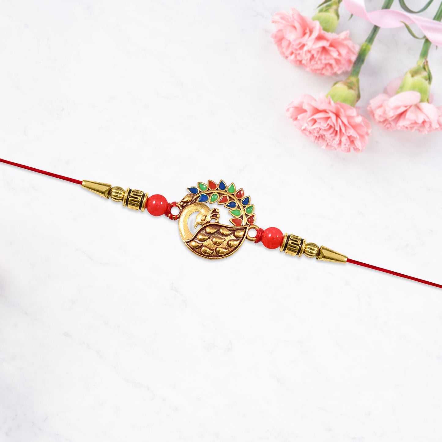 Peacock rakhi tied on brother's wrist celebrating Rakshabandhan festival