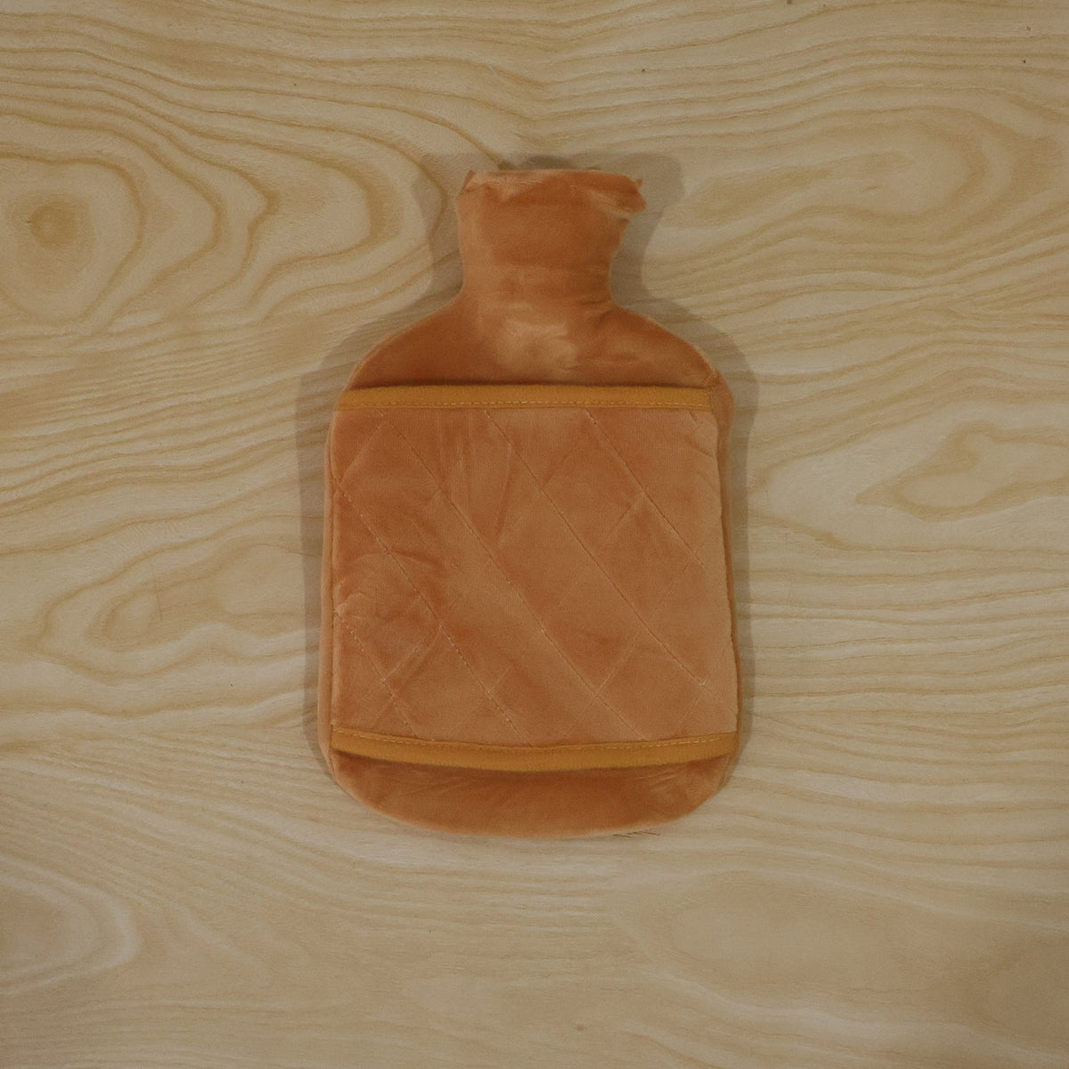 Back view of the plush quilted hot water bottle