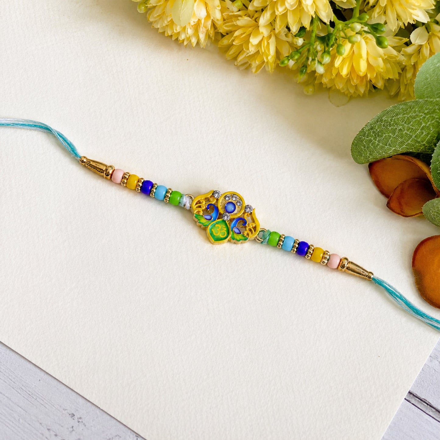 Peacock Design Rakhi with beads on soft thread for brother