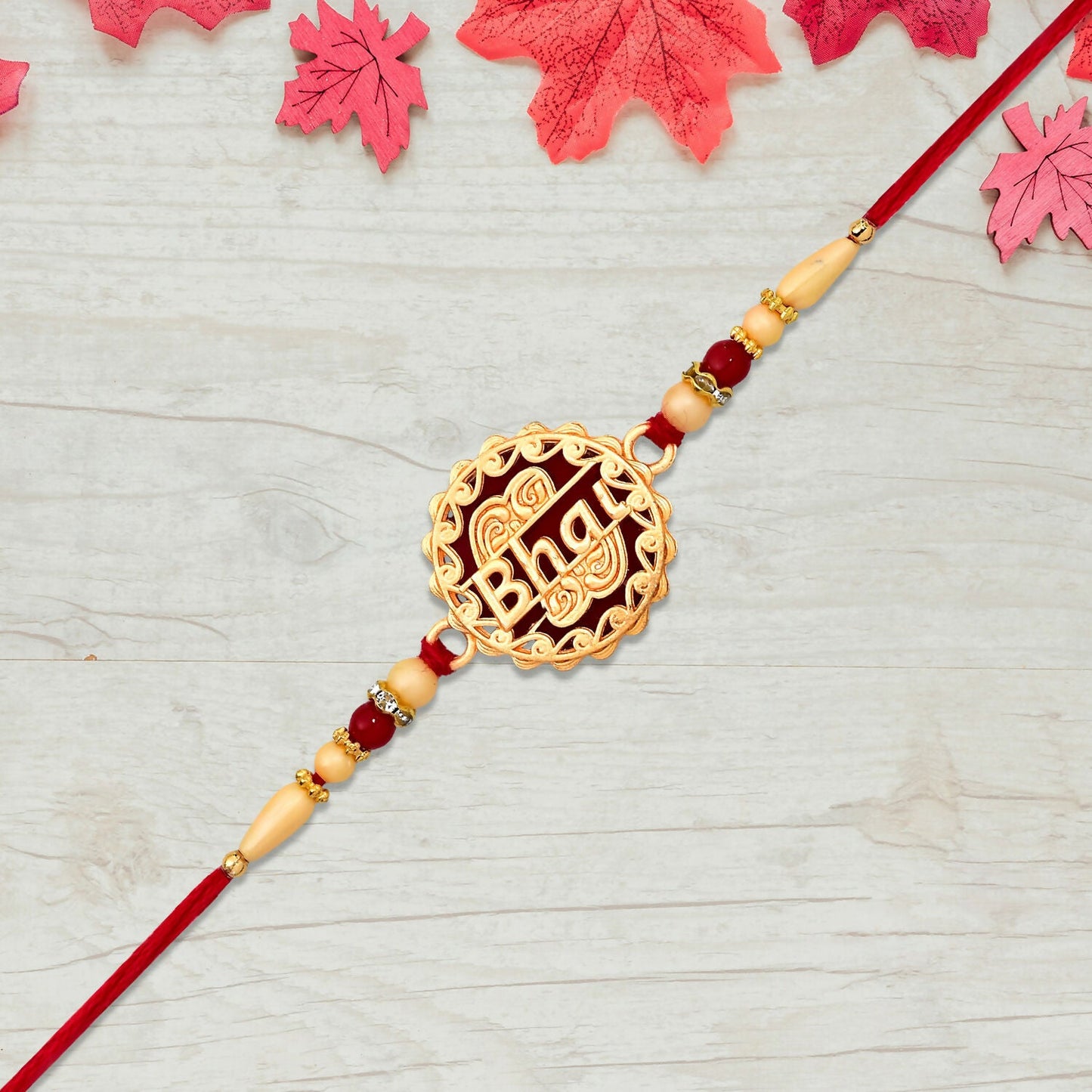 Close-up of ornate golden bead details on Bhai Rakhi