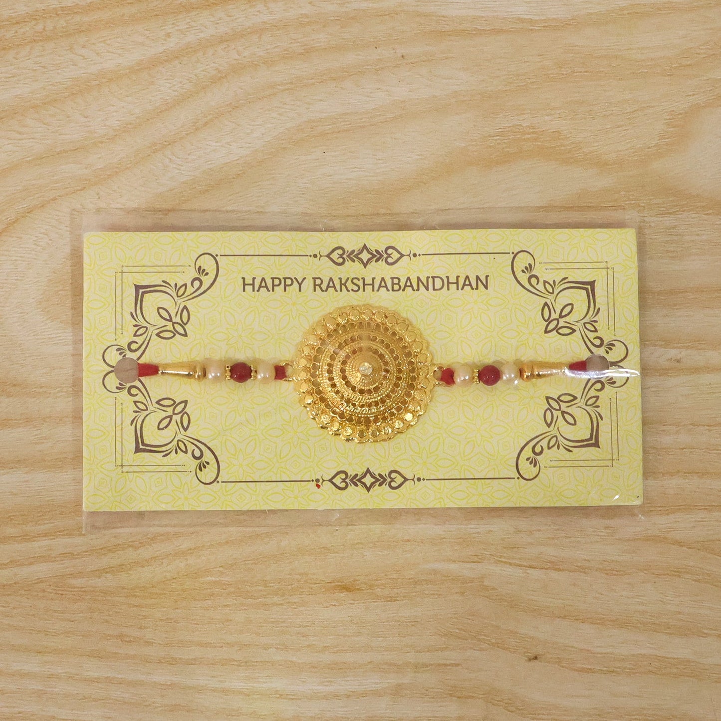 Golden Flower Rakhi shown with festive elements emphasizing gifting appeal for brothers.