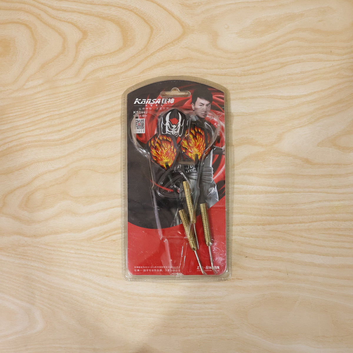 Small steel tip darts in card packing