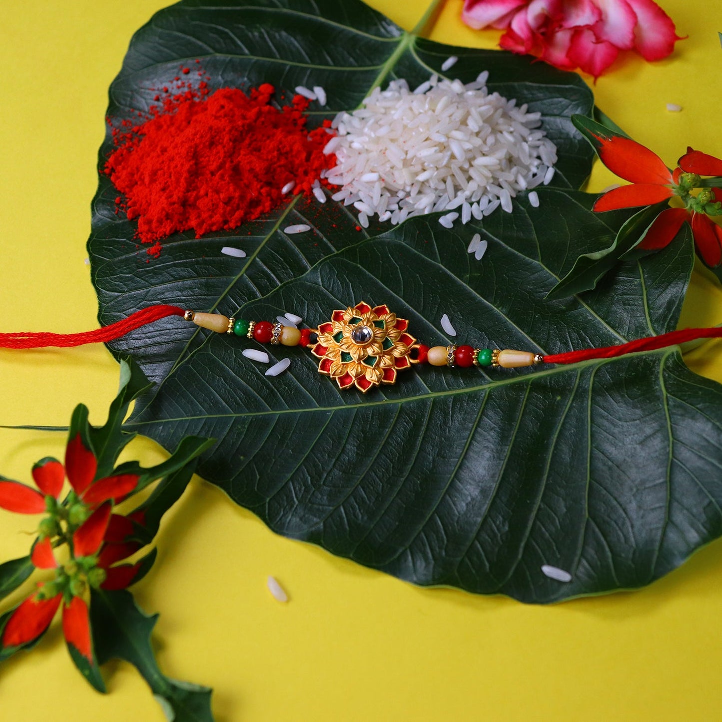 Flower Design Rakhi displayed against a traditional Indian background