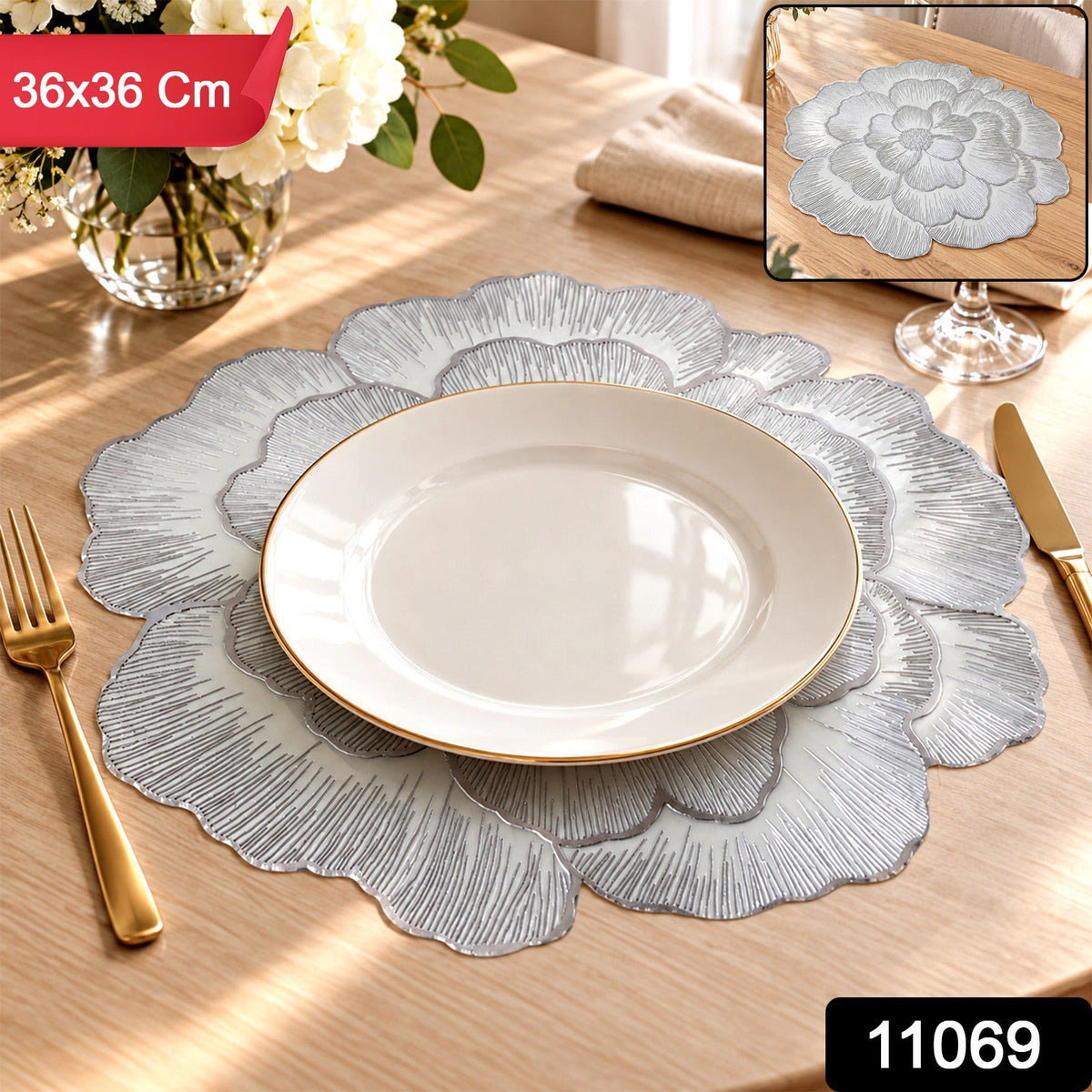 A silver floral placemat with a white plate, golden fork, and knife on a wooden table, with size and product number overlays.