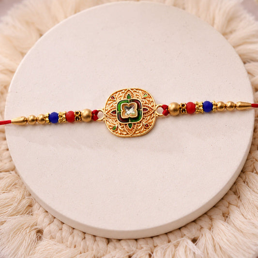 Kundan Rakhi with traditional antique gold finish and vibrant multicolor beads for Raksha Bandhan