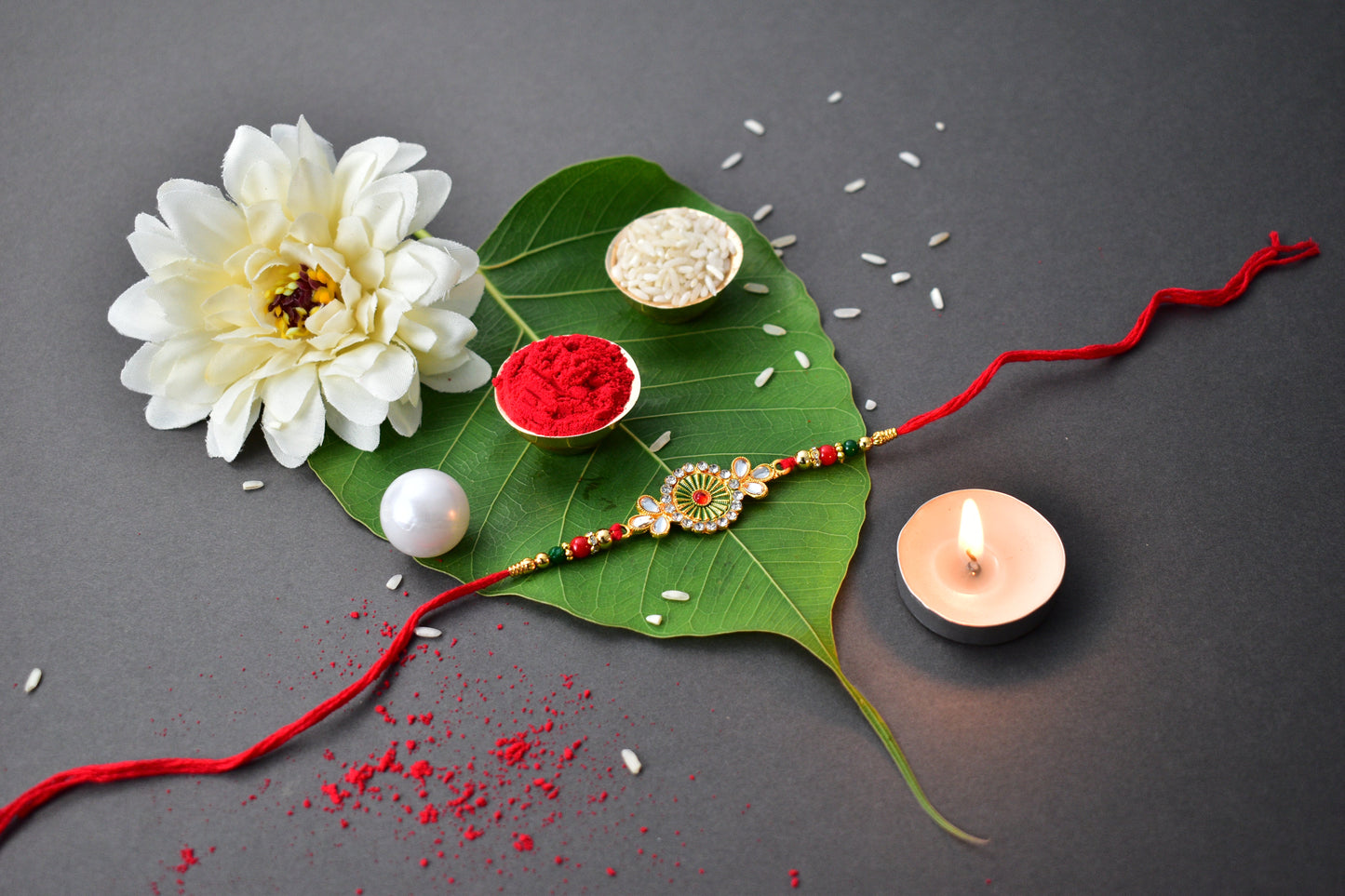 Traditional Floral Design Rakhi carefully crafted on white background highlighting floral pattern