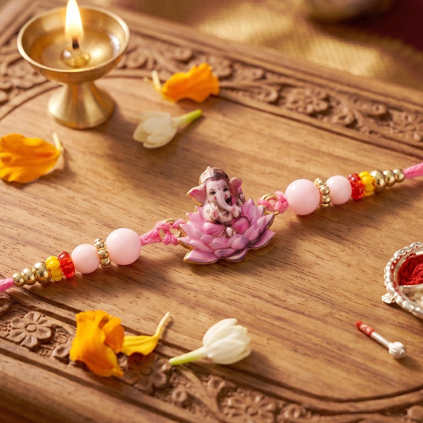 Traditional pink lotus Rakhi with soft thread and beads