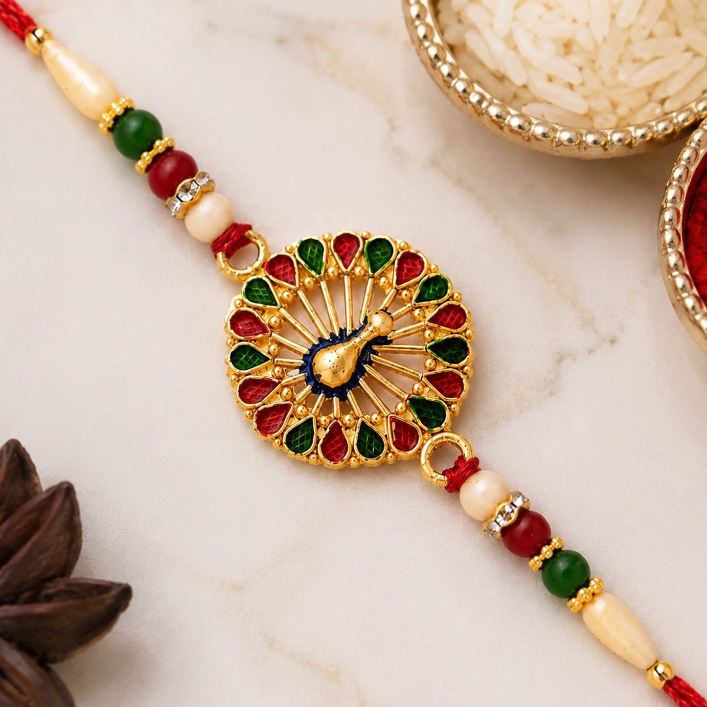 Designer Vinayak Vrat Rakhi with intricate Ganesha motif, handcrafted for brotherly love.