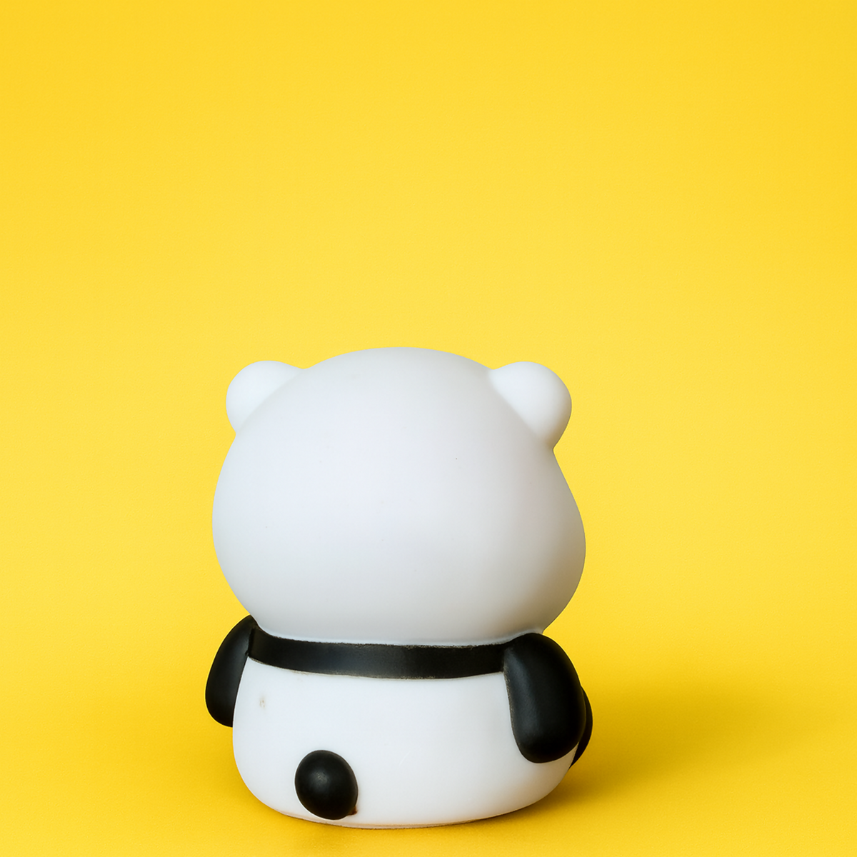 Panda LED night lamp illuminated in a children's bedroom setting
