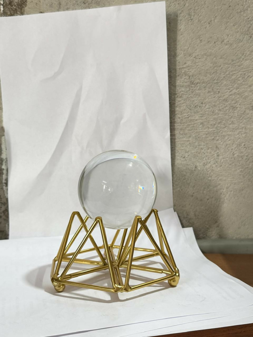 Decorative Crystal Ball with Premium Golden Geometric Stand for Home Office Desk | Clear Glass Sphere Showpiece for Table Decoration, Vastu, Meditation, Feng Shui, Gifting | Modern Luxury Home DÃ©cor Ornament