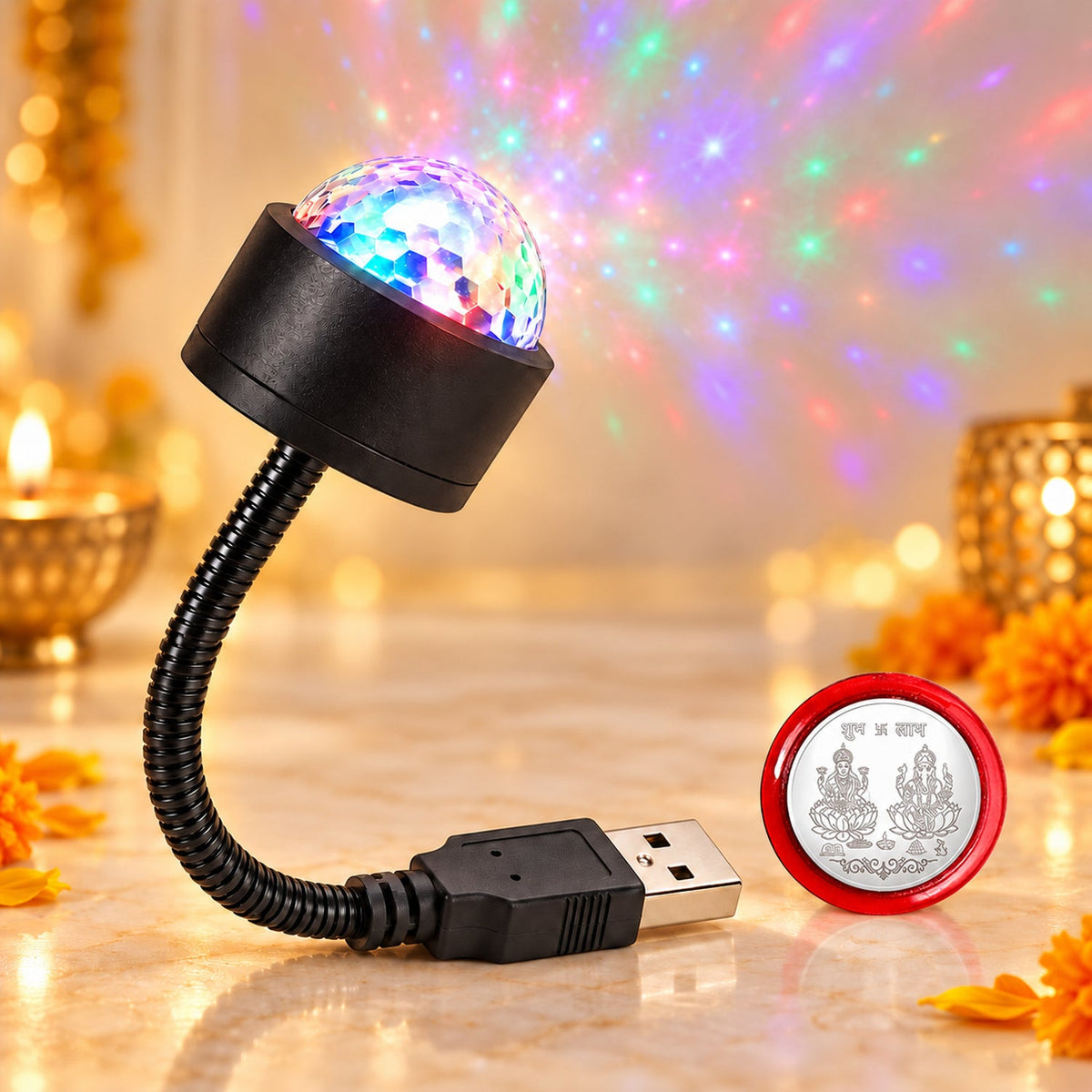 A USB star galaxy light and a silver coin with Hindu deities engraved on it.
