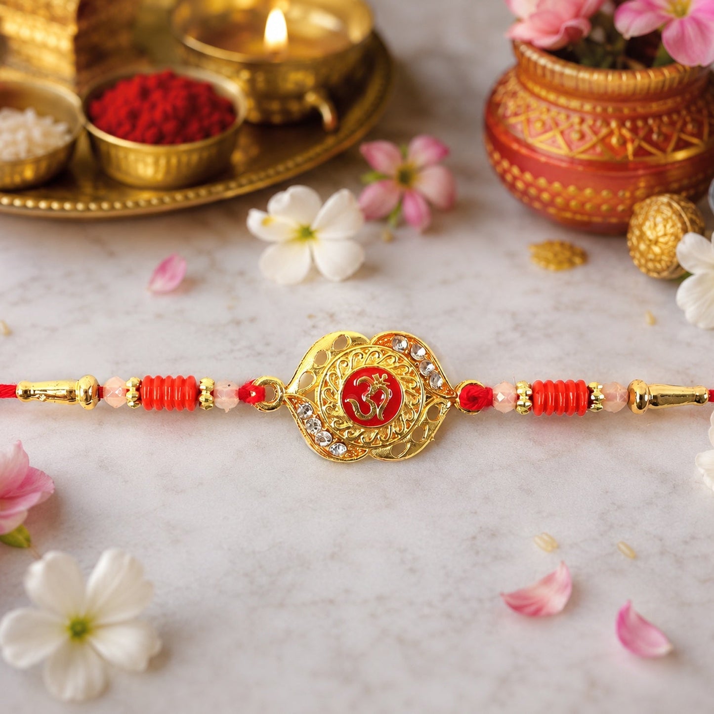 Close-up of floral decorative beads on OM Antique Rakhi.