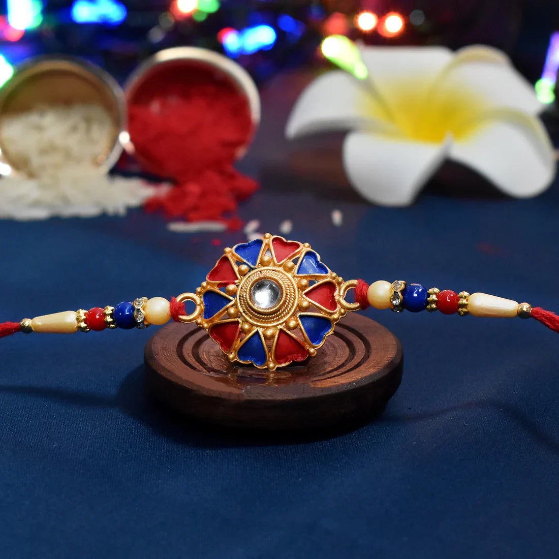 Traditional Designer Rakhi – Elegant Floral Enamel Design