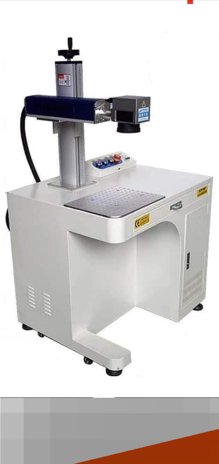 Wide view of SVL 30W laser engraving machine installed in industrial workspace