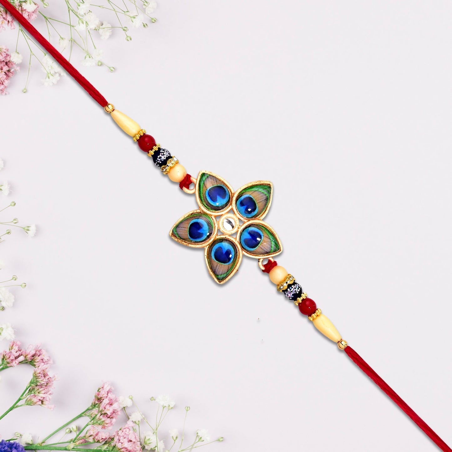 Beautiful mor pankh star-shaped rakhi symbolizing sibling bond