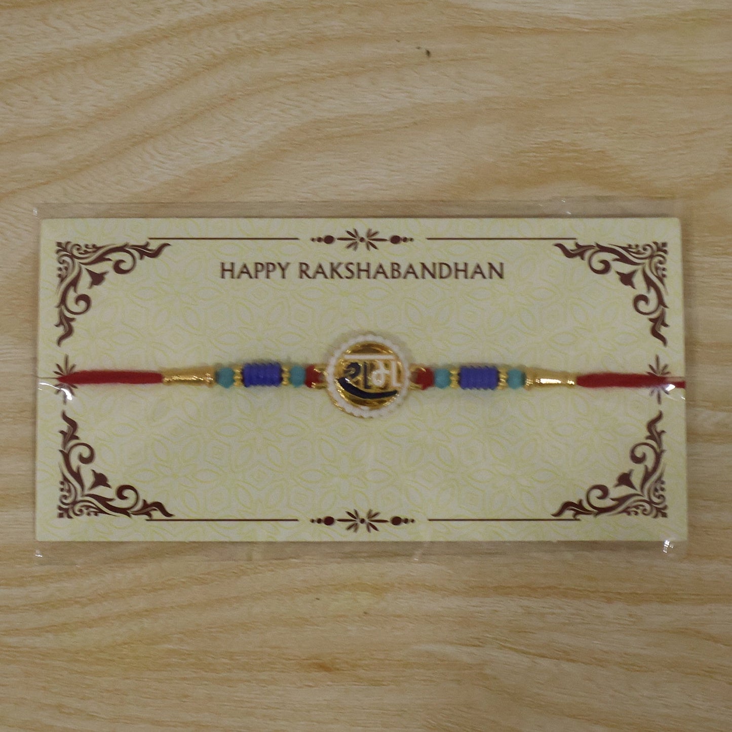 Festive design of traditional Devnagari Rakhi with beads for Raksha Bandhan