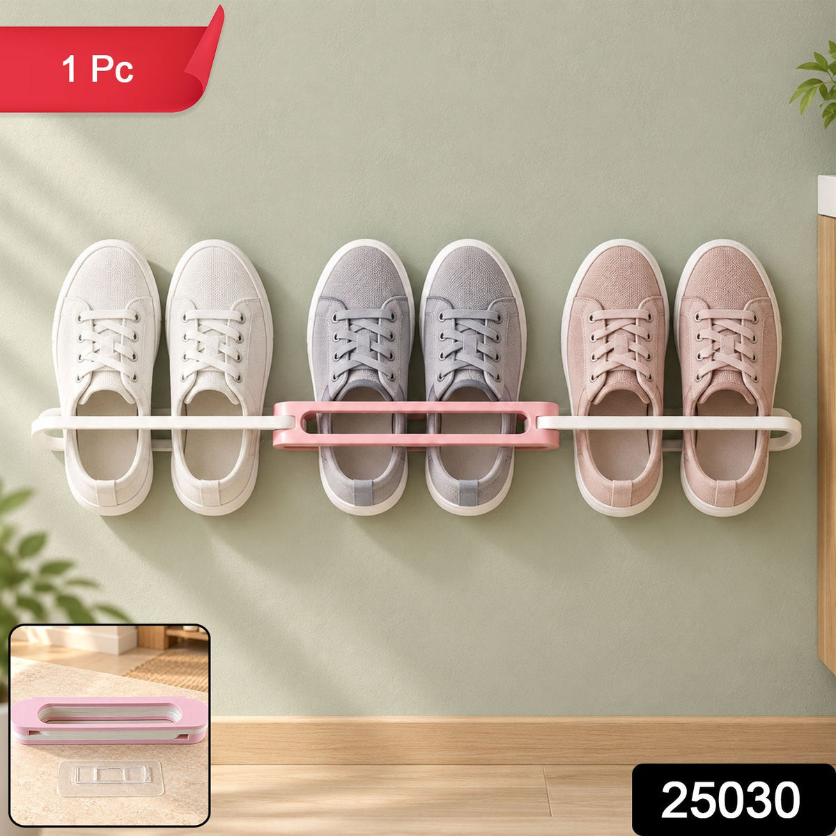 A pink and white folding shoe rack holds three pairs of sneakers on a light green wall. â€“ view 8