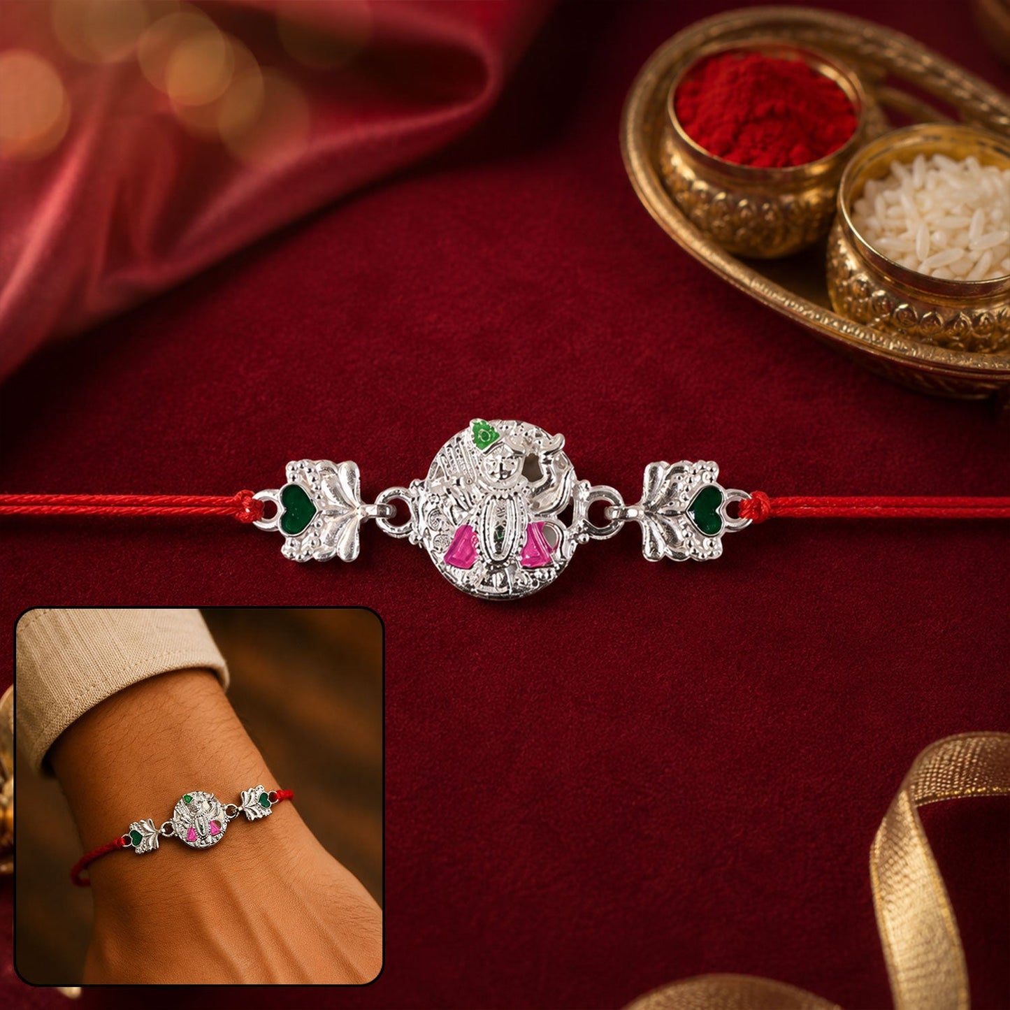 Silver Shrinathji Rakhi with pink & green stones and elephant charms