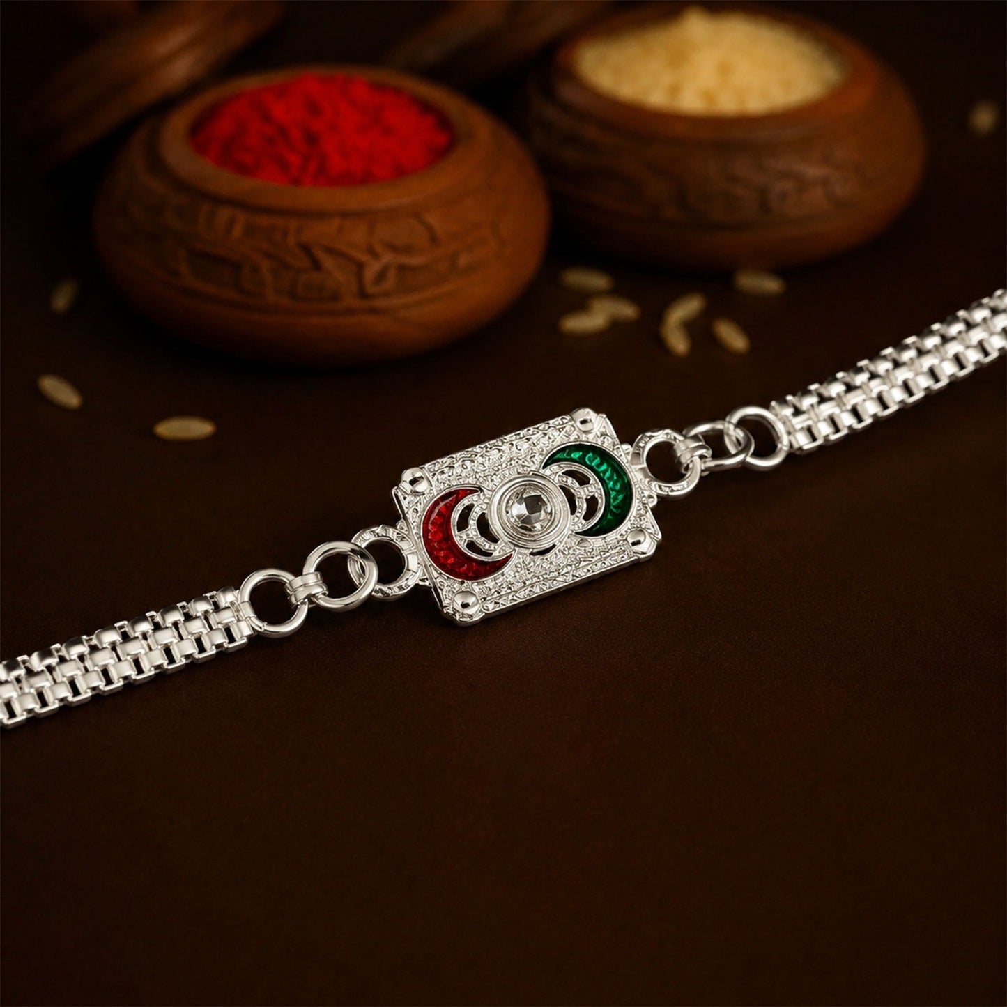 Geometric rakhi with linked ring design and polished chain for Raksha Bandhan