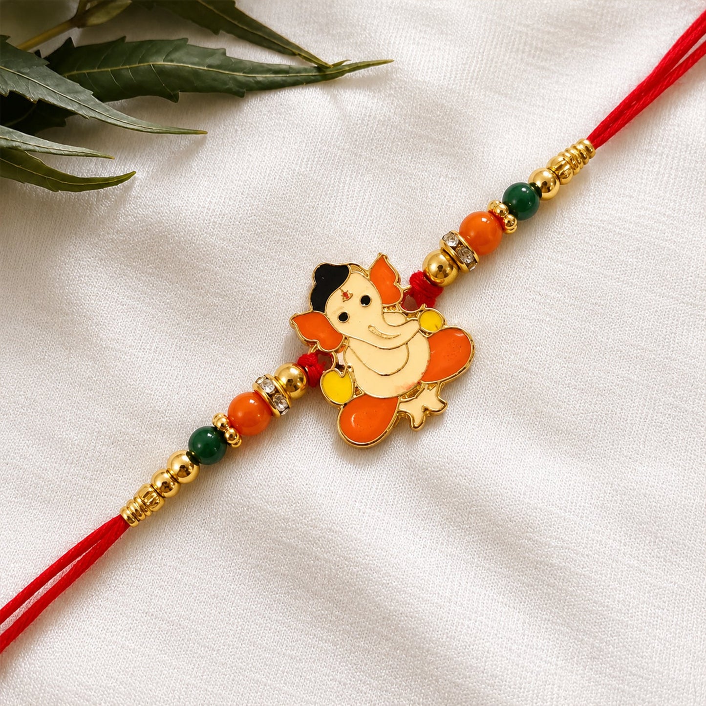 Lord Ganesha designer Rakhi with multicolor beads close-up