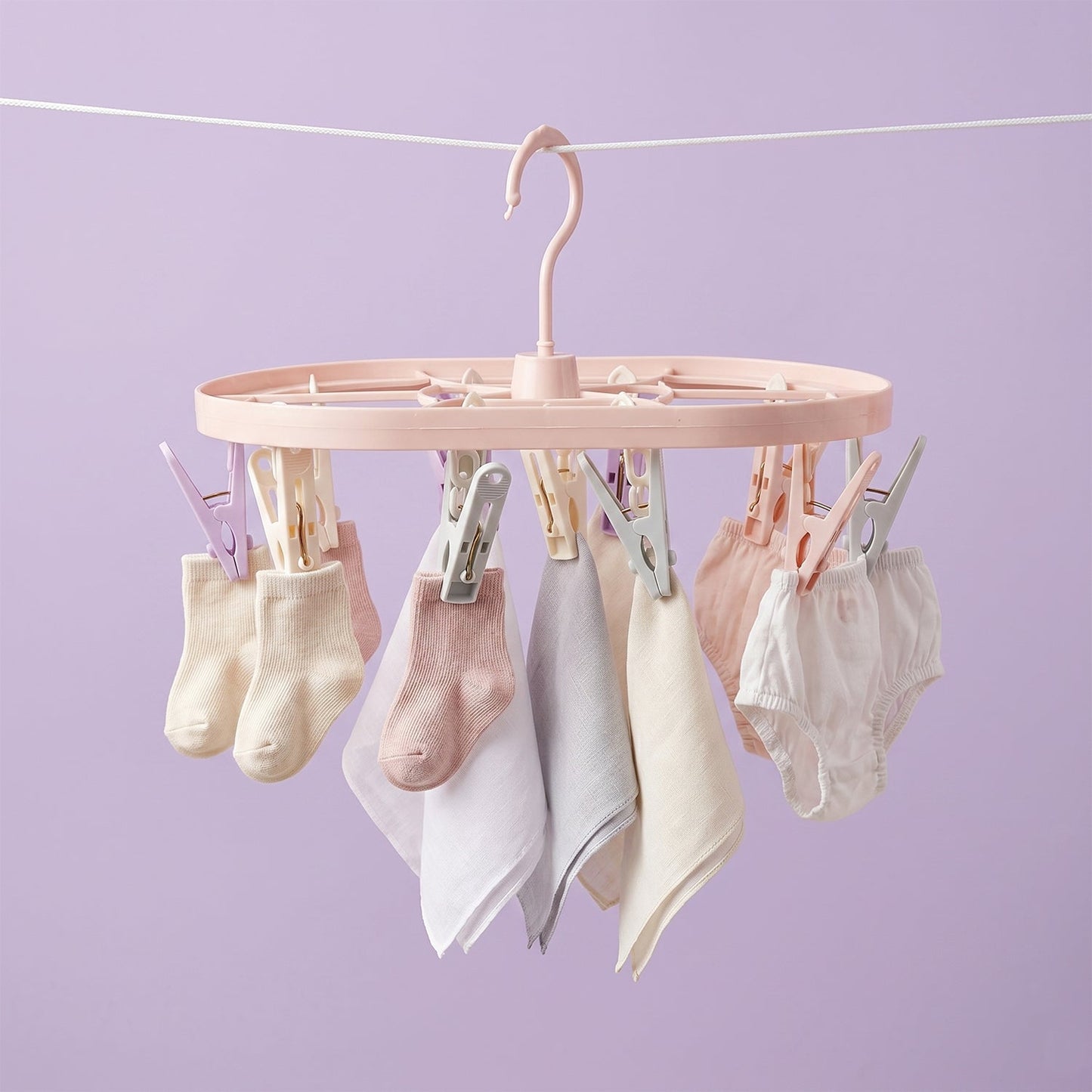 Strong spring-loaded plastic clips ideal for trousers, towels, and clothing accessories