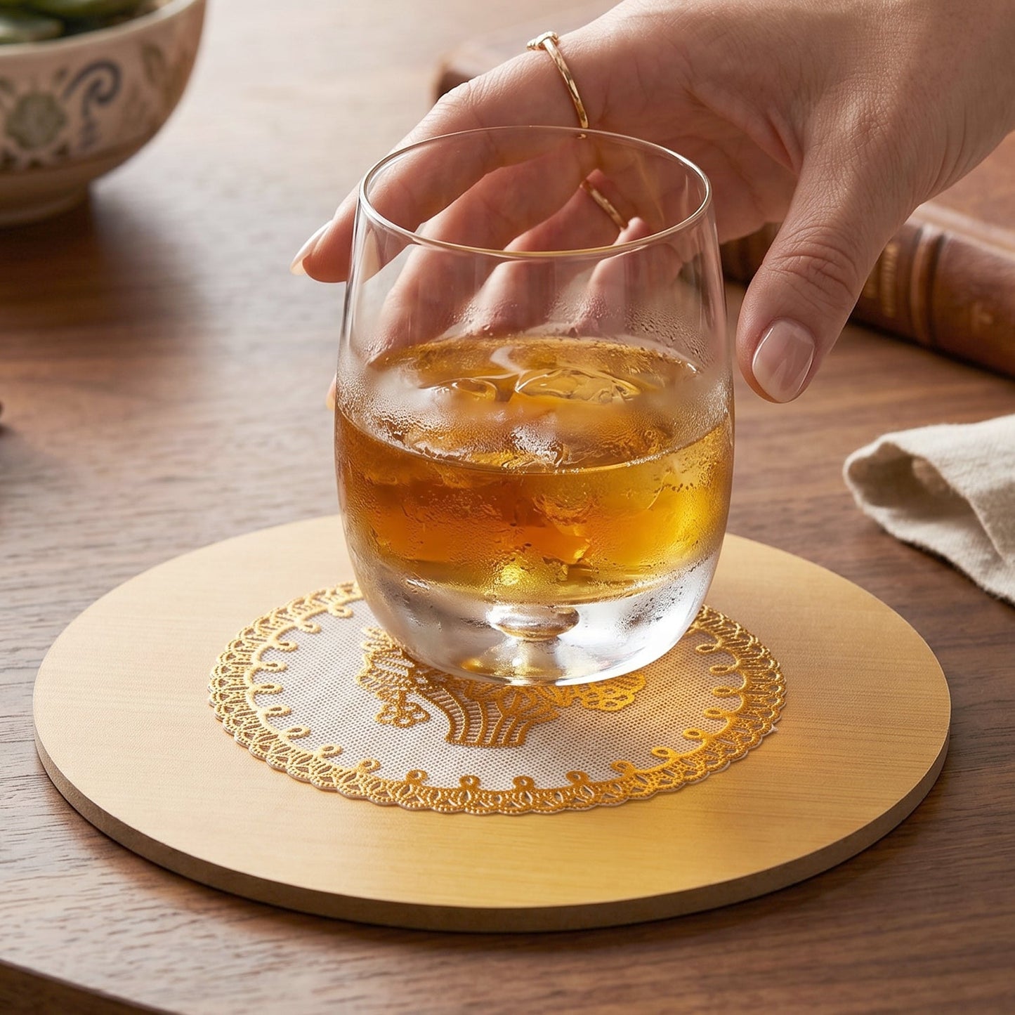 Side view of a round wooden heat-resistant coaster.