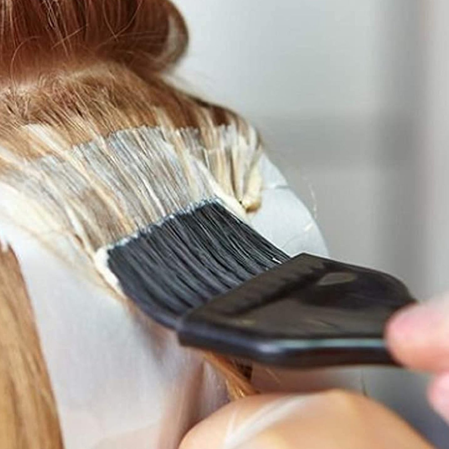 Hair dye applicator kit with brushes, bowl, and comb for easy coloring