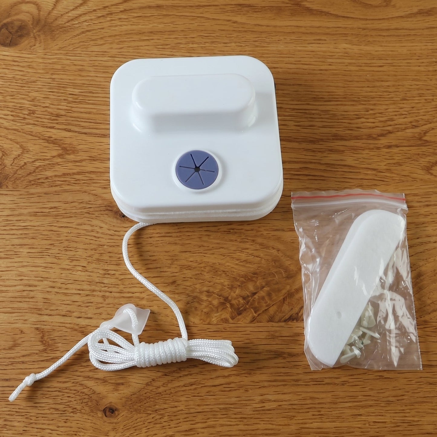 Window cleaning magnet tool with rope for hard to reach panes