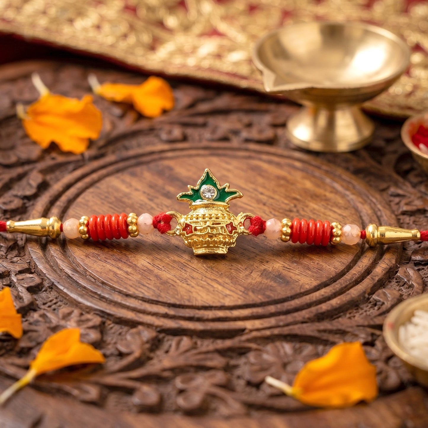 Close-up of Sacred Kalash Rakhi showing intricate design
