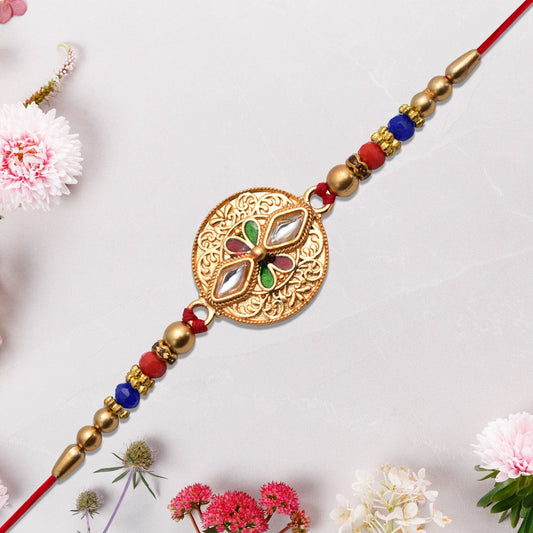 Close-up of Meenakari Kundan Work Rakhi with antique finish showcasing intricate design