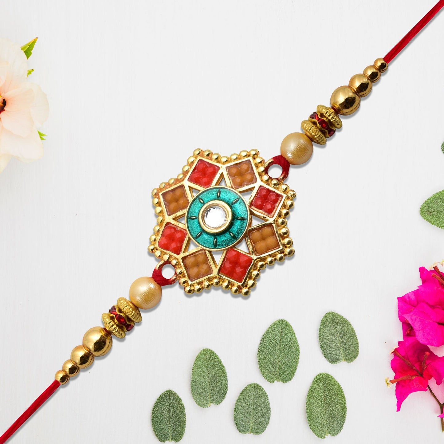 Traditional Unique Shape Rakhi featuring intricate handcrafted design on a soft thread