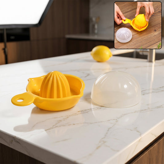 Yellow hand operated citrus juicer