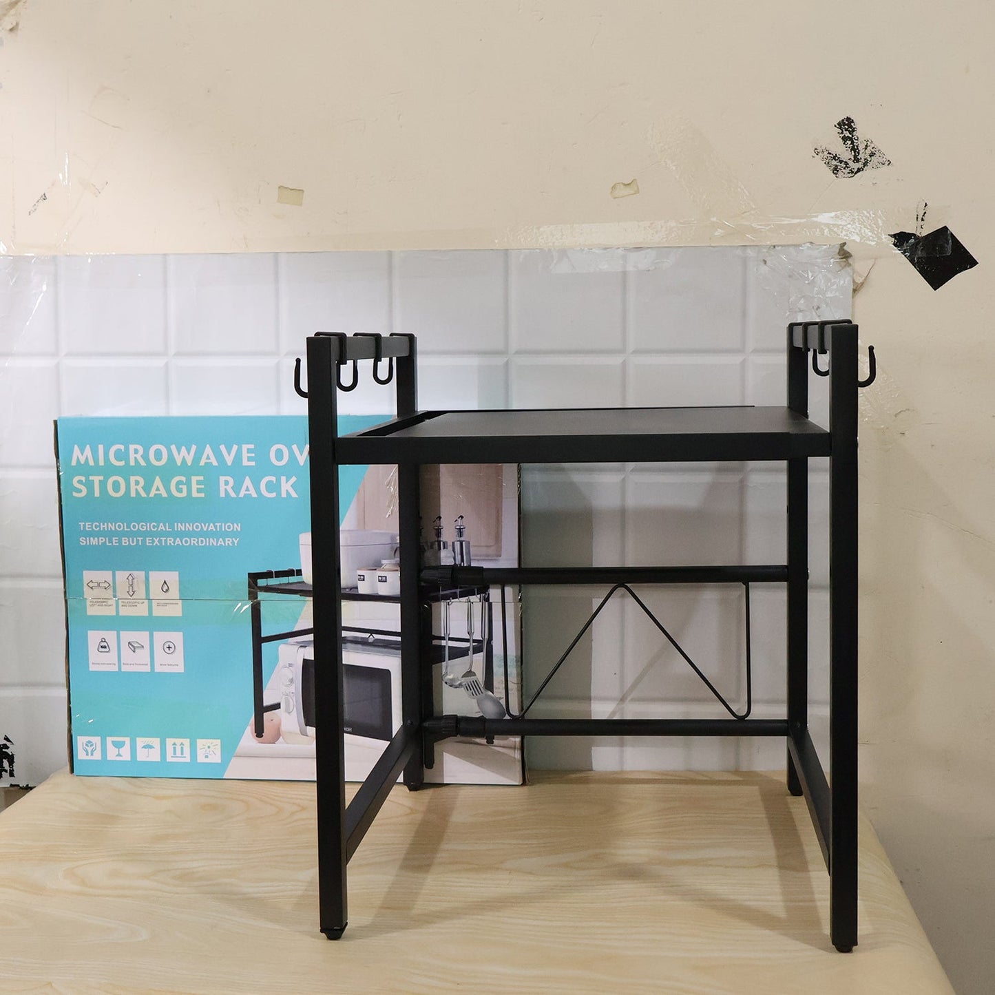 Live photo of adjustable microwave oven storage rack