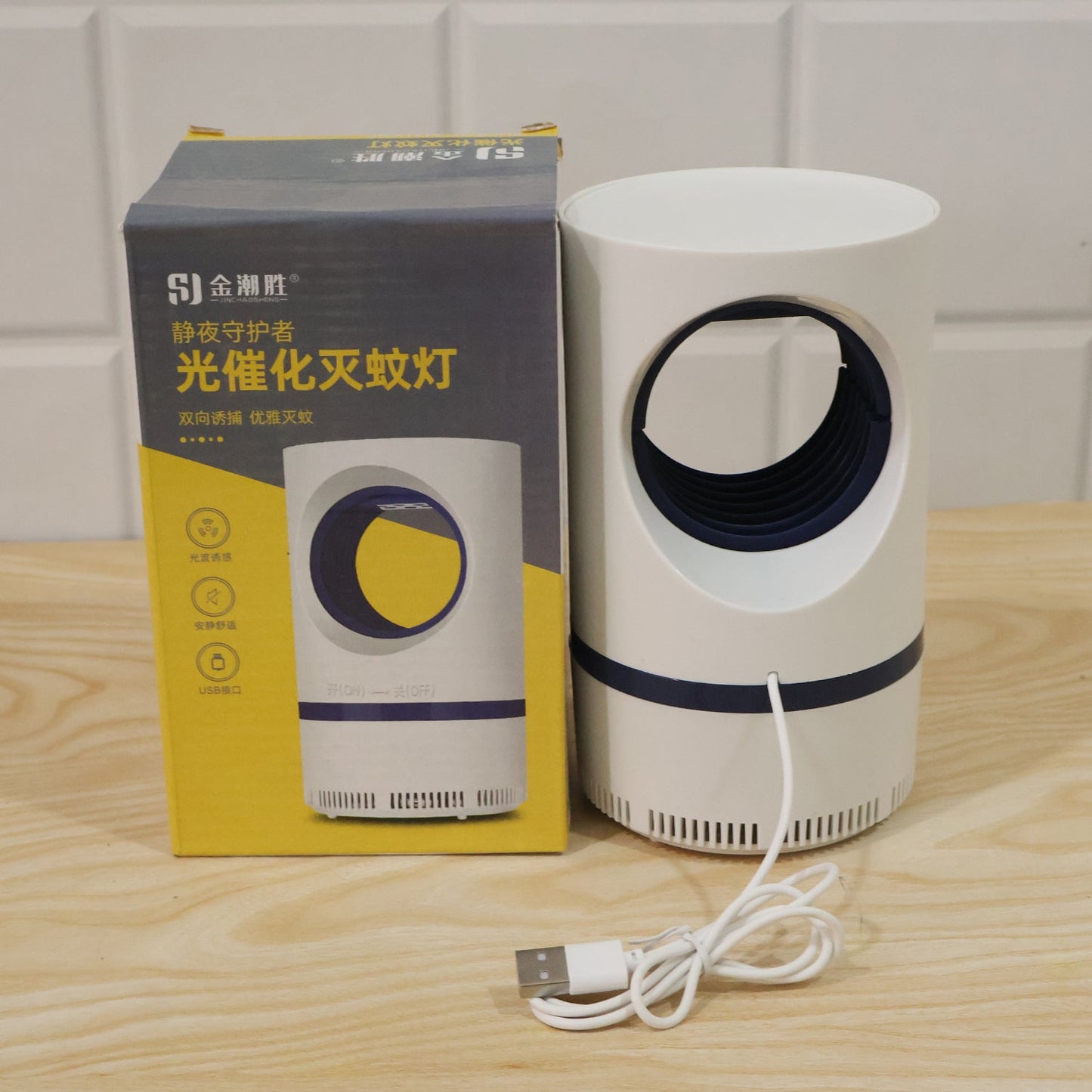 Quiet suction mosquito trap for safe indoor pest control