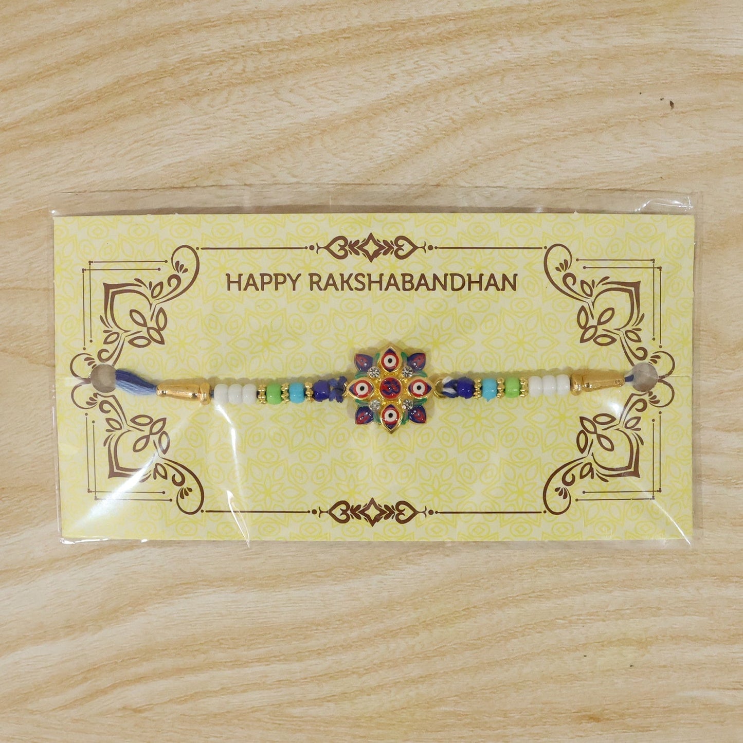 Evil Eye OM Star Rakhi with spread thread showing craftsmanship
