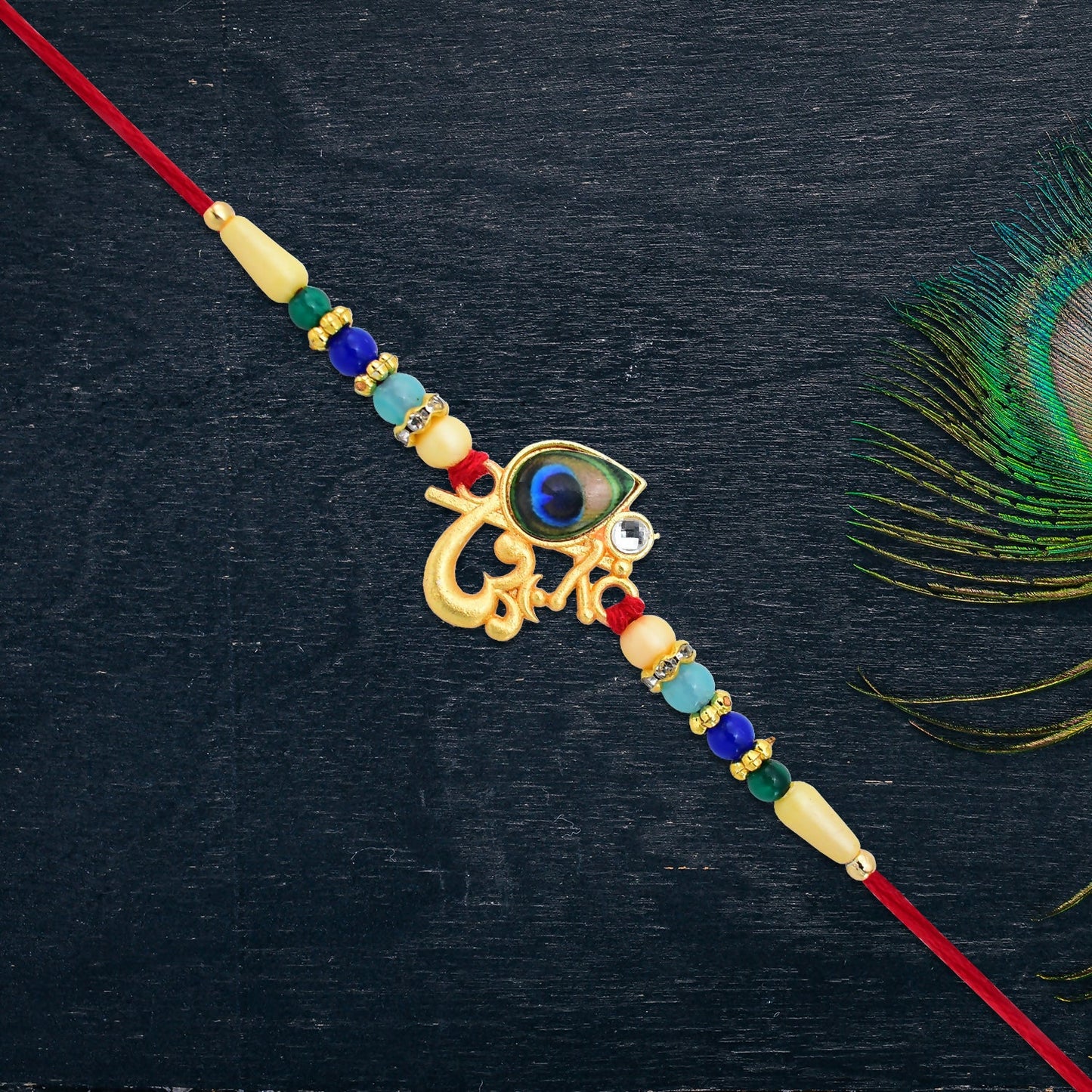 Peacock Feather Rakhi displayed on traditional Indian Raksha Bandhan thali