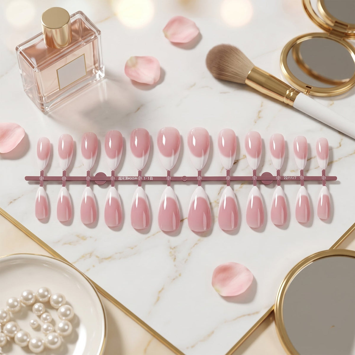 Set of artificial nail tips with white tips and pink base