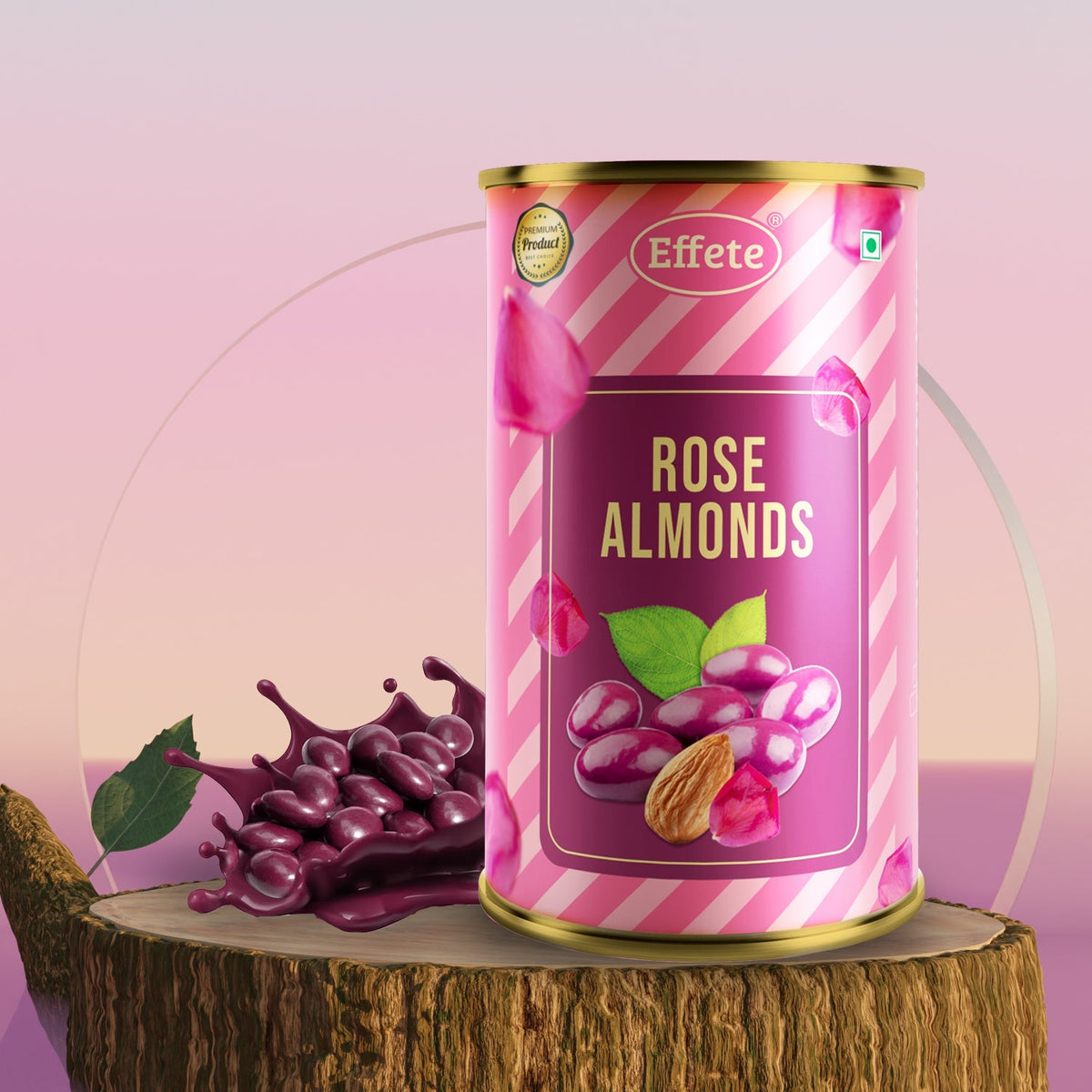 Pink and white striped tin of rose almonds on a tree stump, with a splash of purple liquid and chocolate pieces.